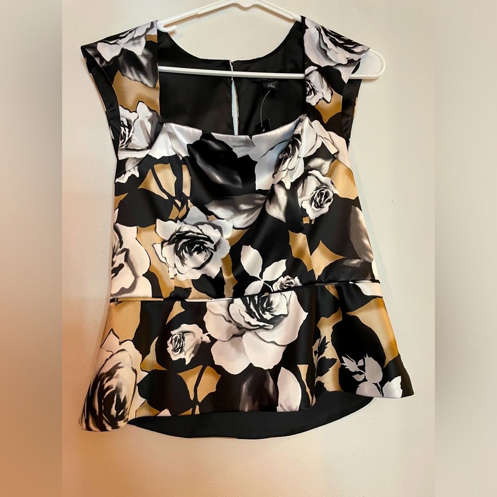 Pretty, feminine, fitted black, gold and white flower blouse